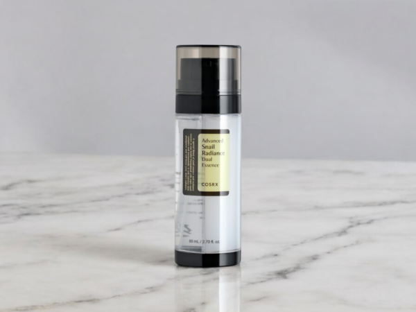 Flacon de COSRX Advanced Snail Radiance Dual Essence présenté seul, sans emballage.